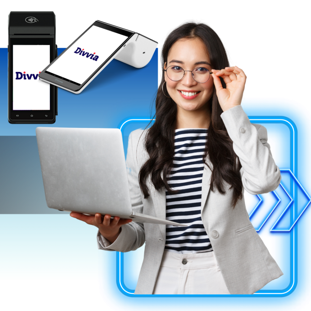 A business woman with a laptop that has a confident smile on her face. Divvia's payment processing solutions and payment terminals showcased alongside her.